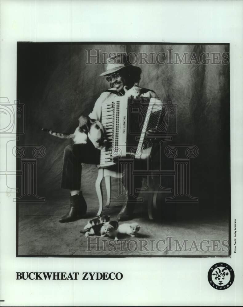 Entertainer Buckwheat Zydeco with baby kittens, Musician - Historic Images