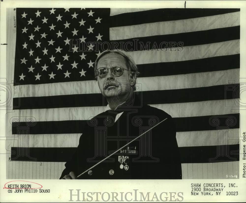 Actor Keith Brion as John Philip Sousa, Conductor in front of flag - Historic Images