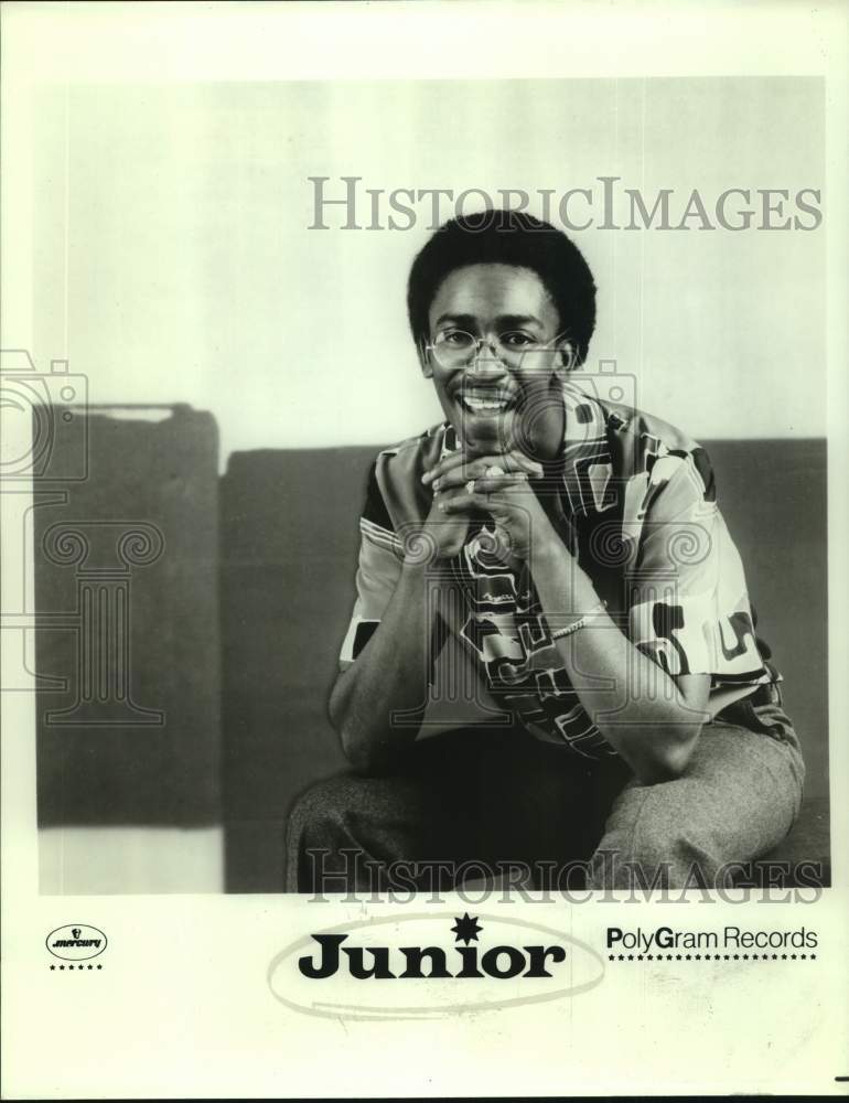 Entertainer "Junior" smiles in portrait - Historic Images