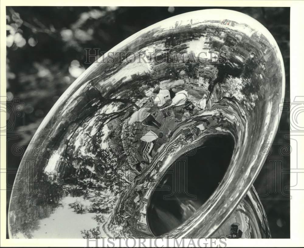 1986 Press Photo Alamo City Band reflected in tuba at Jazz Alive Festival.- Historic Images