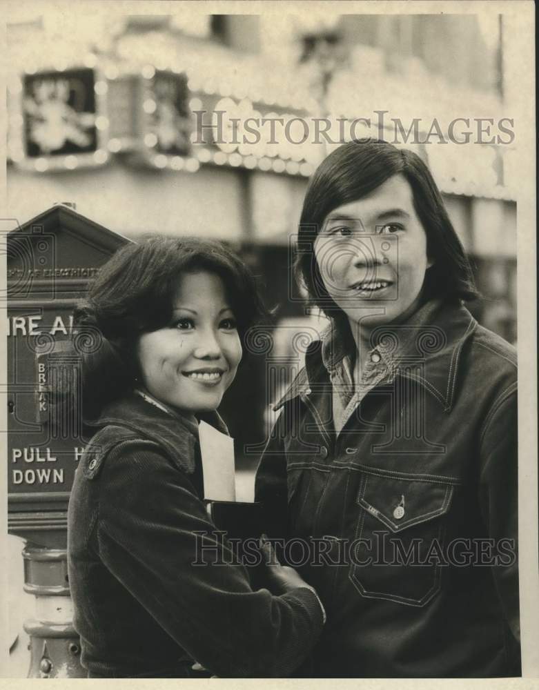 Press Photo Man and Woman Smiling in Portrait - Historic Images