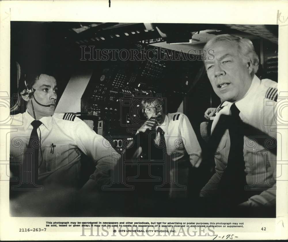 1979 Press Photo Actors Alain Delon, David Warner, George Kennedy in Airport '79- Historic Images