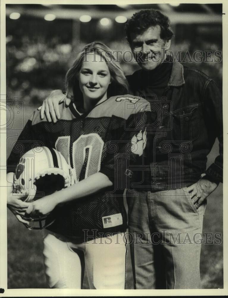 Actress Helen Hunt in Football Uniform with Co-Star - Historic Images
