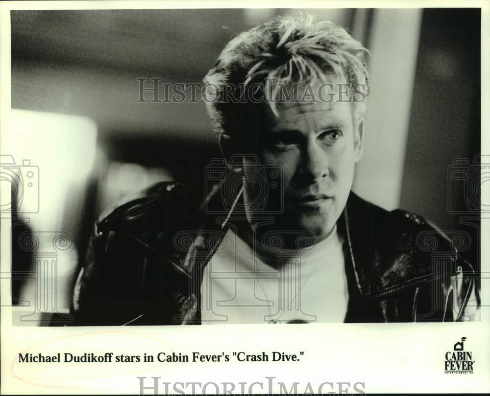 Press Photo Michael Dudikoff in a scene from Crash Dive. - Historic Images