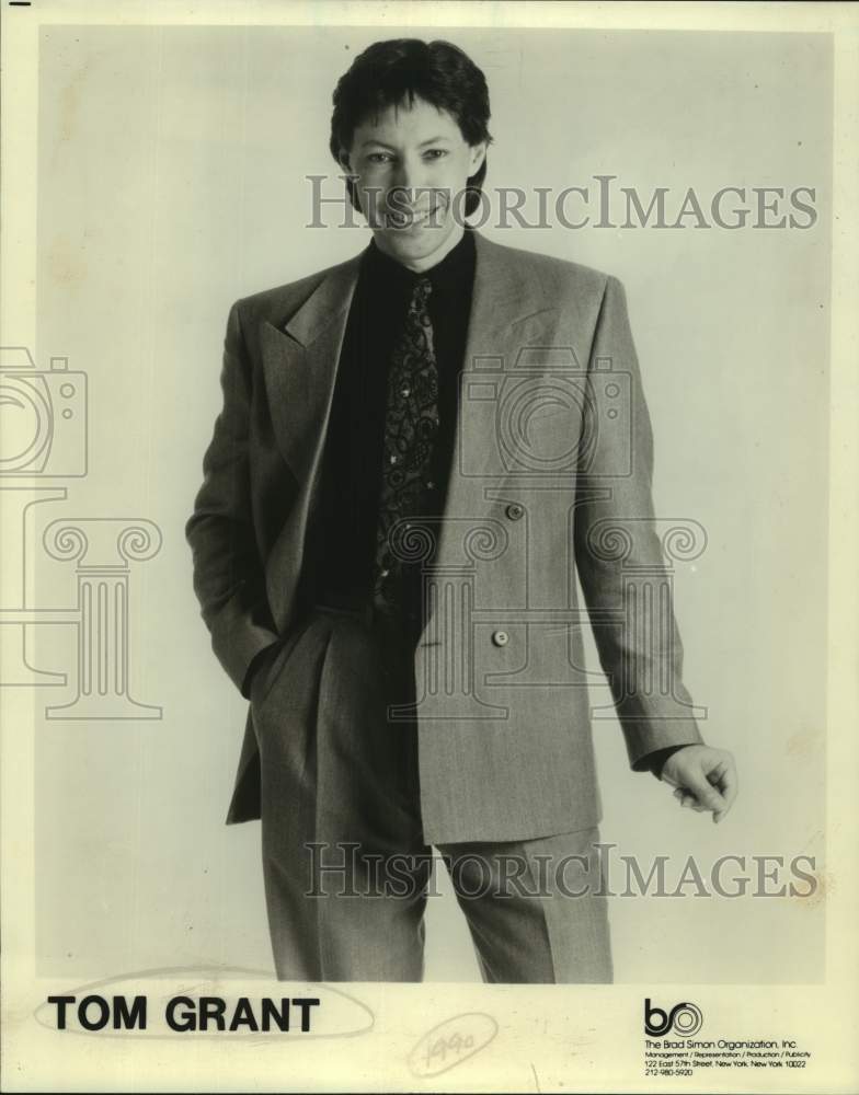 1990 Press Photo Entertainer Tom Grant in portrait smiling - sap23347- Historic Images