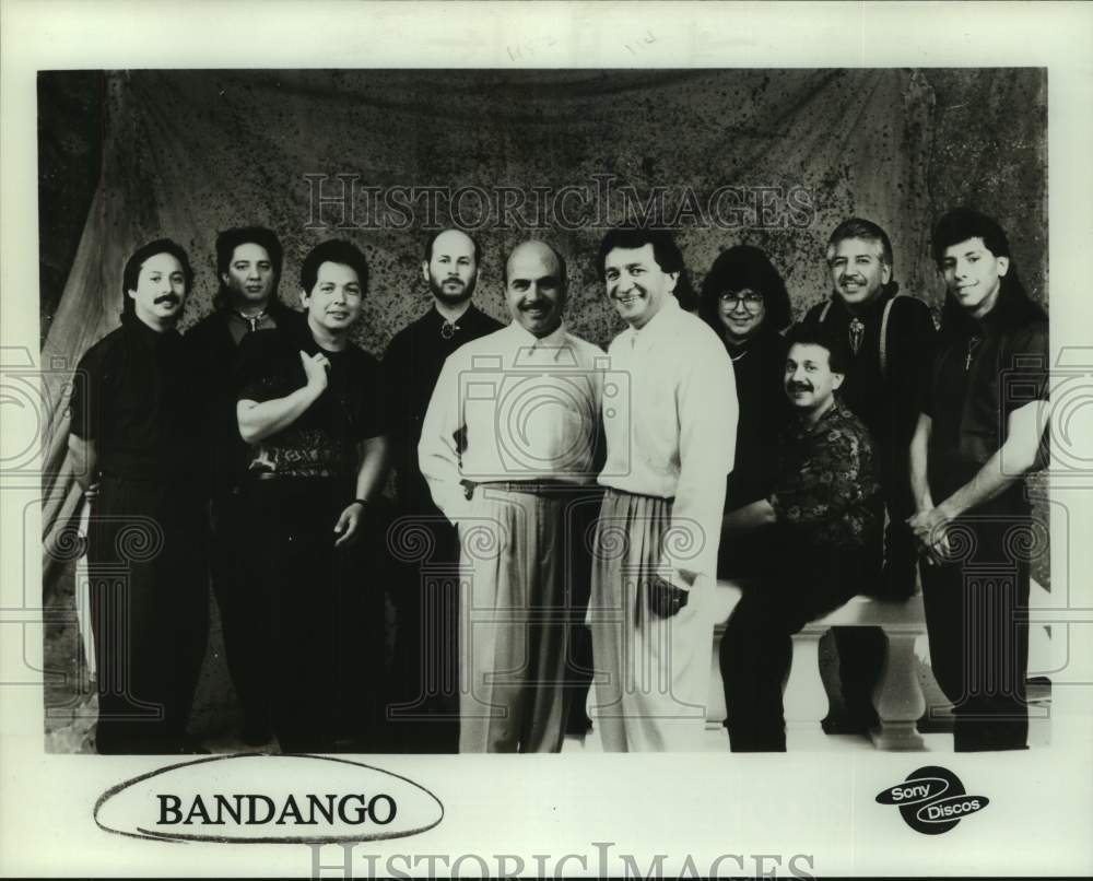 Rick Vasquez and members of Bandango, Latin music group. - Historic Images