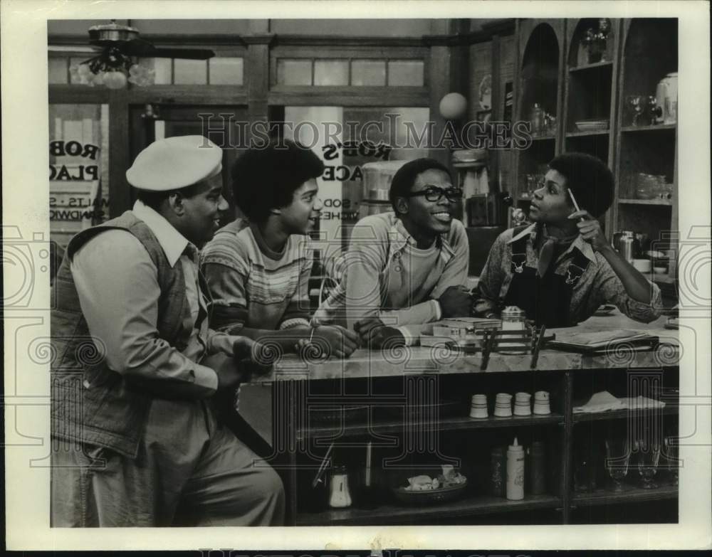 Actor Maywood Nelson with co-stars in show scene - Historic Images