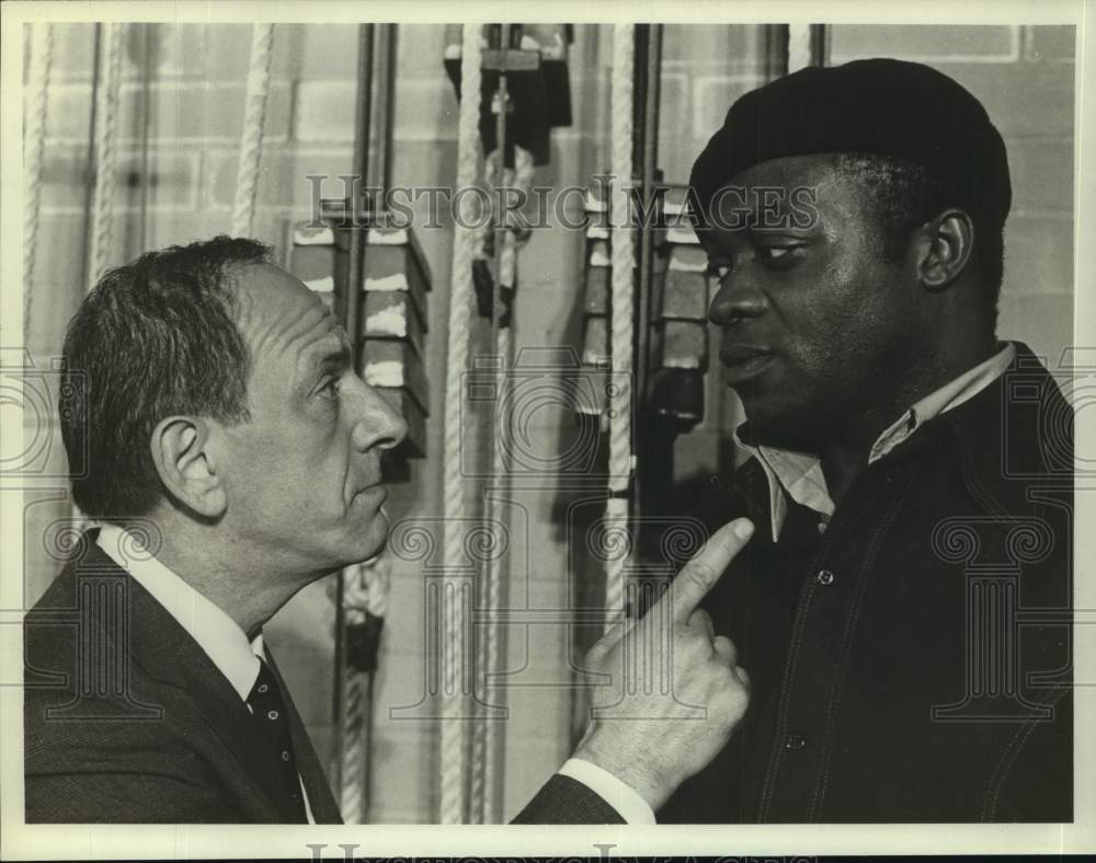 Actor Yaphet Kotto with co-star in closeup - Historic Images