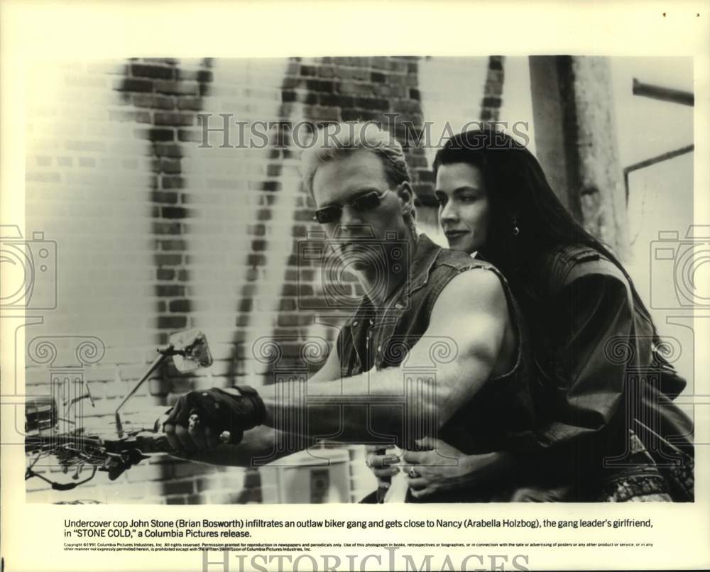 1991 Press Photo Brian Bosworth and Arabella Holzbog in scene from &quot;Stone Cold&quot; - Historic Images