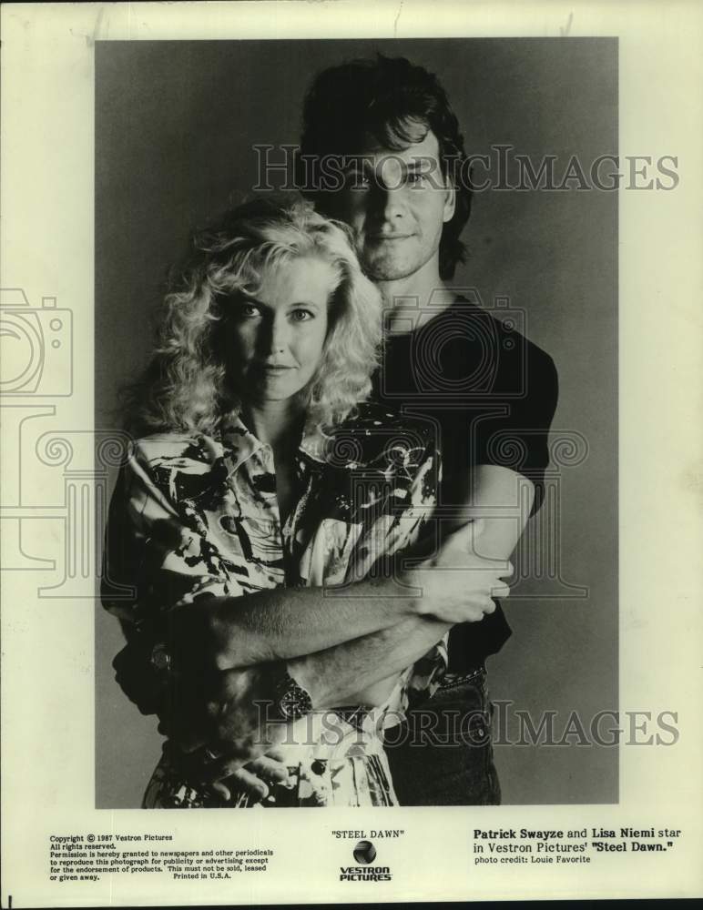 1987 Press Photo Actors Patrick Swayze and Lisa Niemi in &quot;Steel Dawn&quot; - Historic Images