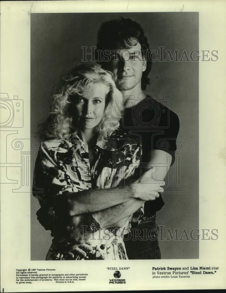 1987 Press Photo Actors Patrick Swayze and Lisa Niemi in "Steel Dawn" - Historic Images