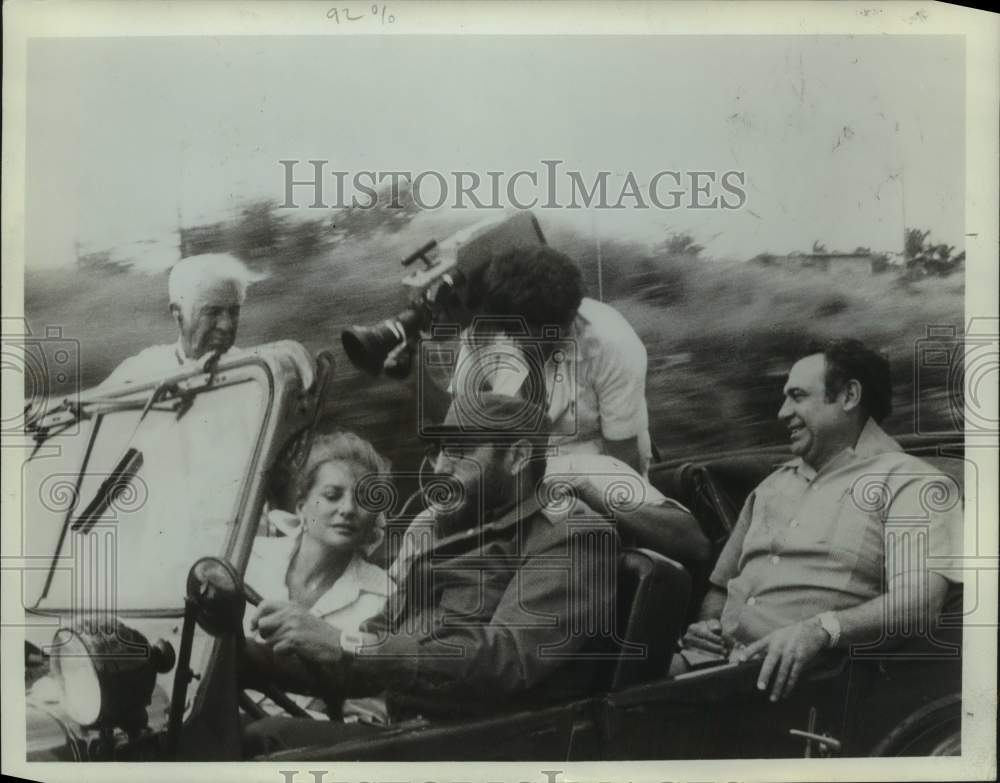 Press Photo Host Barbara Walters and Film Crew Ride in Open Car - Historic Images