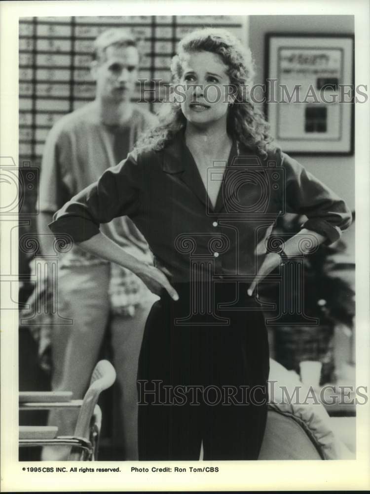 1995 Press Photo Actress in Scene with Co-Star in Background - Historic Images