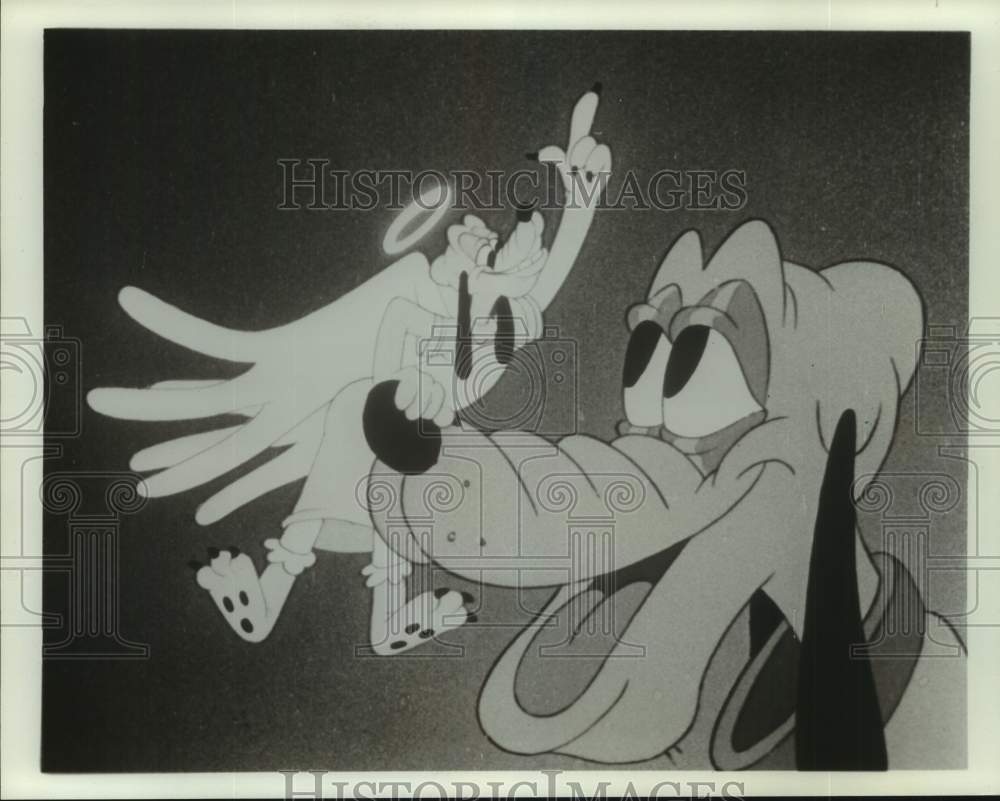 Press Photo Disney&#39;s Pluto with his angel sitting on his nose - Historic Images