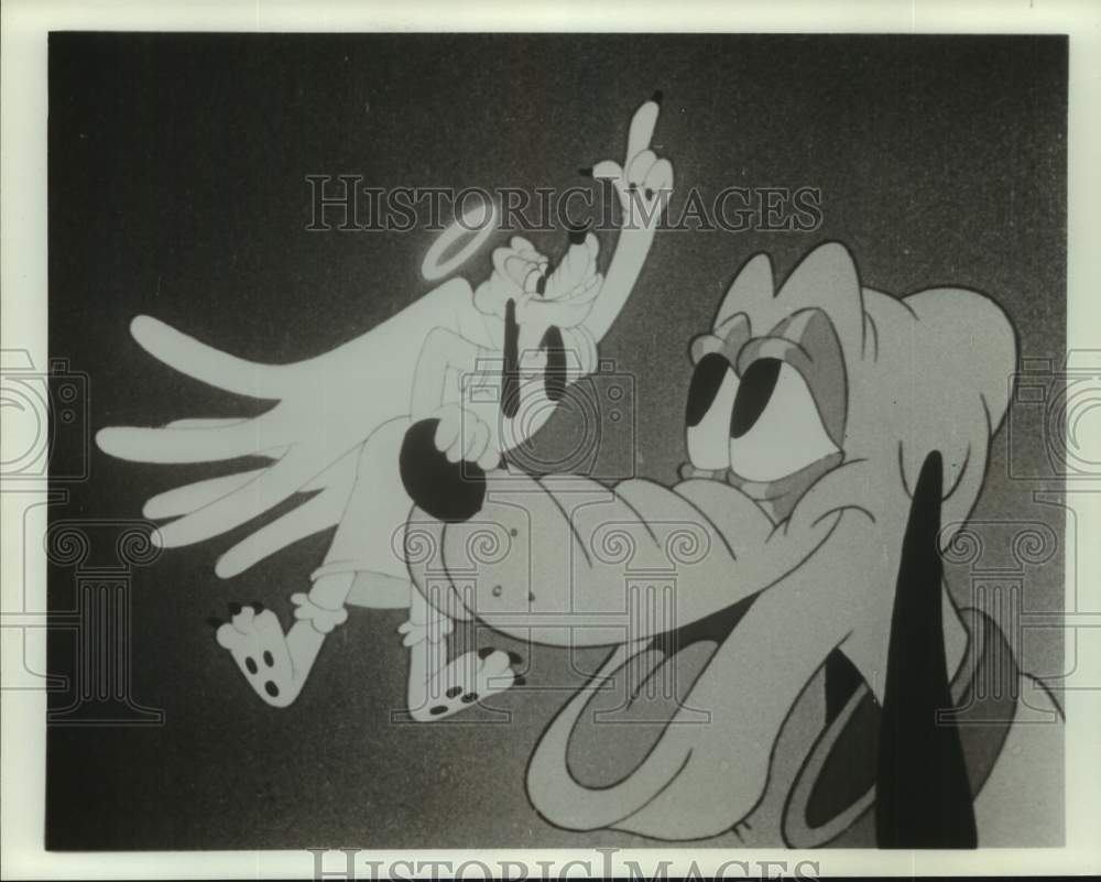 Press Photo Disney's Pluto with his angel sitting on his nose - Historic Images
