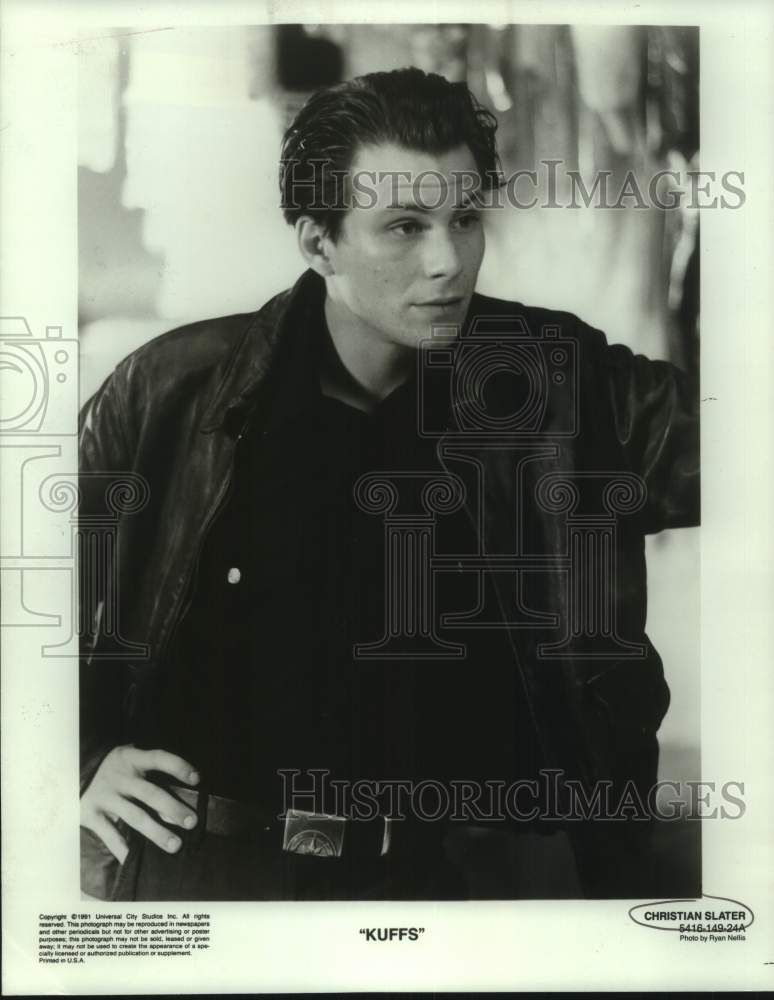 1991 Press Photo Christian Slater in a scene from Kuffs. - Historic Images