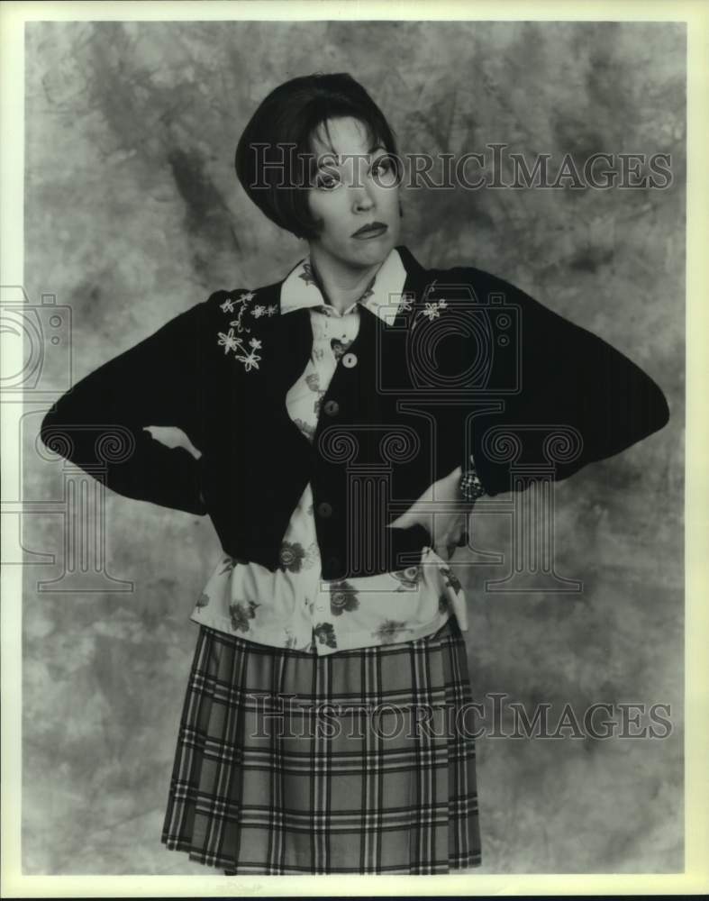 Press Photo Actress in Skirt & Sweater Poses With Hands on Hips - Historic Images