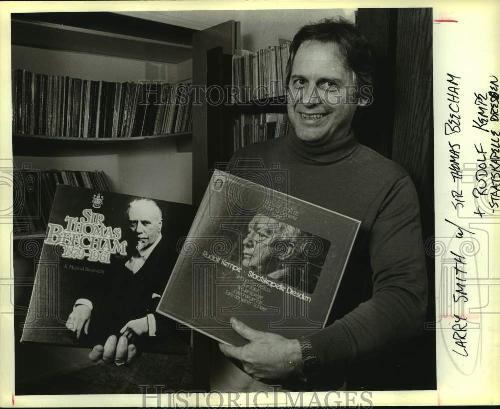 Press Photo Larry Smith with records of Thomas Beecham and Rudolf Kempe. - Historic Images