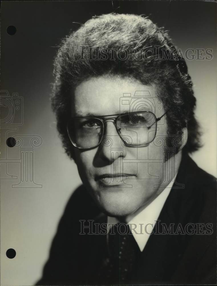 Press Photo A man poses for a promotional photo. - Historic Images