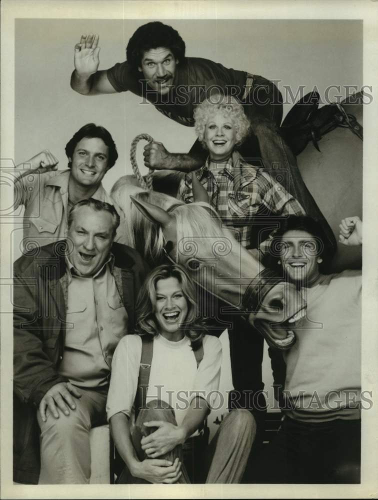 Press Photo Group of Actors Pose With Fake Horse - Historic Images