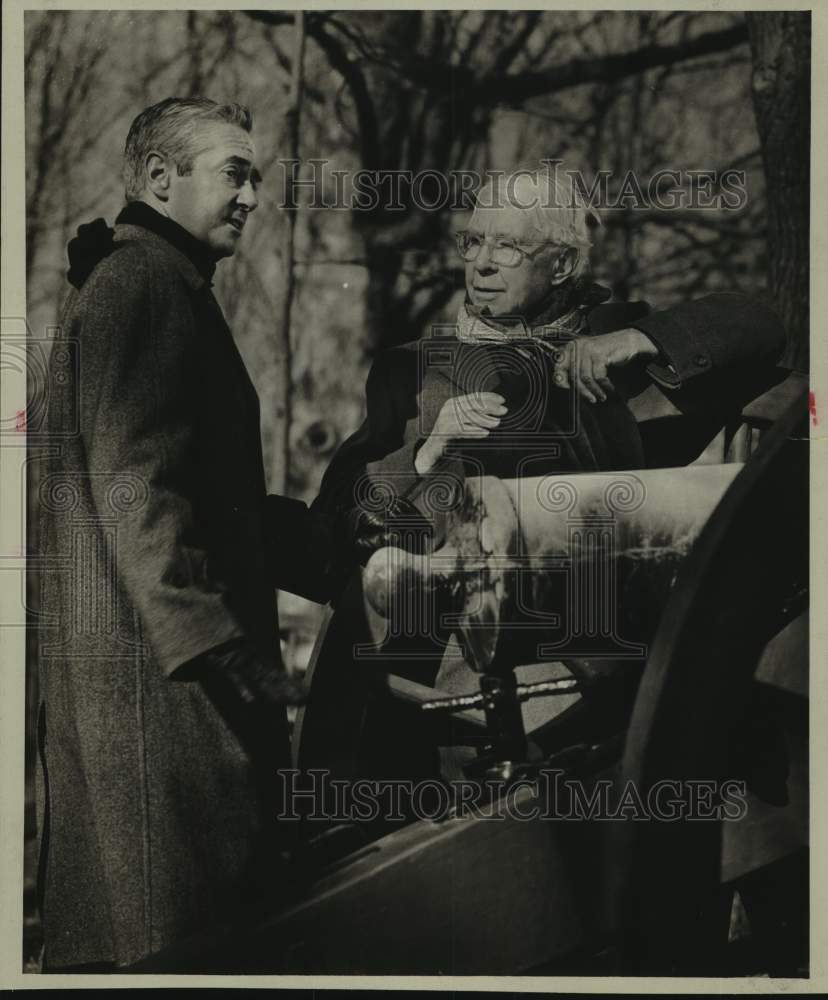 1961 Press Photo Commentator Howard K. Smith & Carl Sandburg Talk Near Cannon - Historic Images
