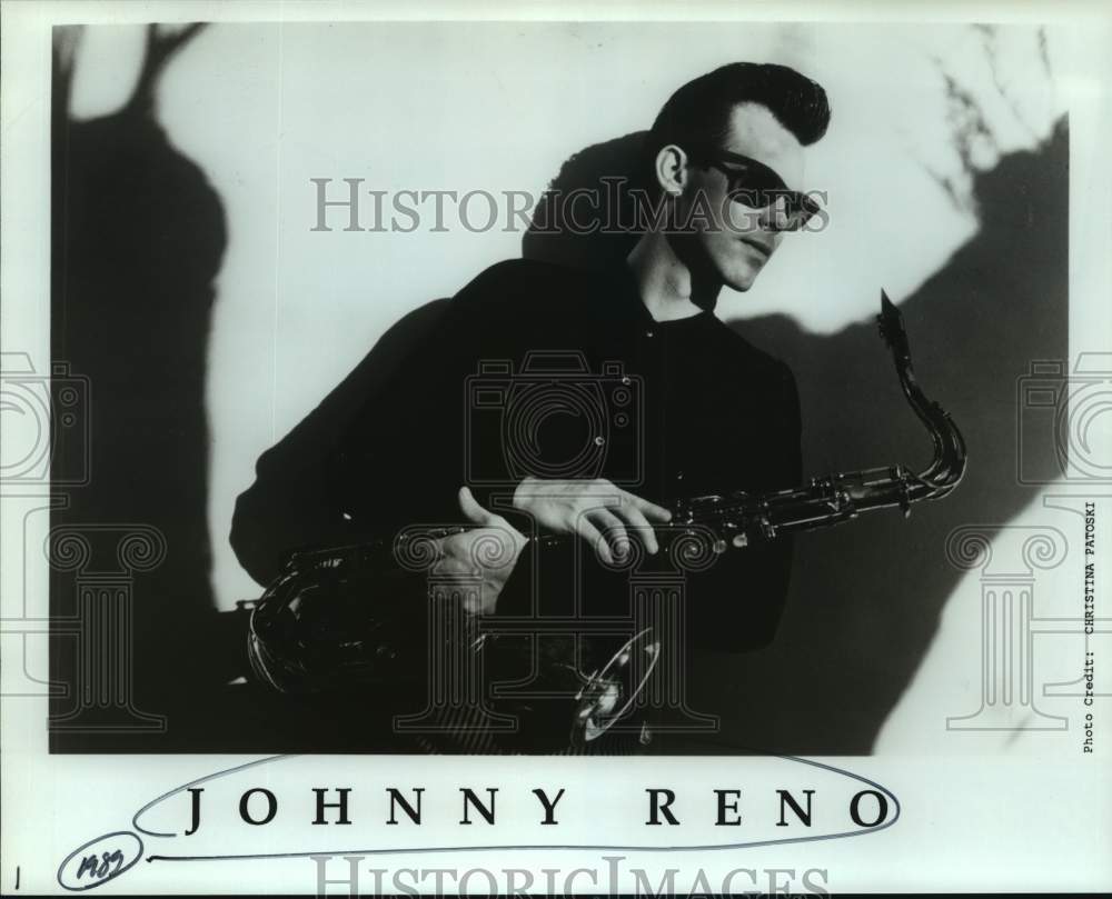 1989 Press Photo Musician Johnny Reno Poses With Saxophone - Historic Images