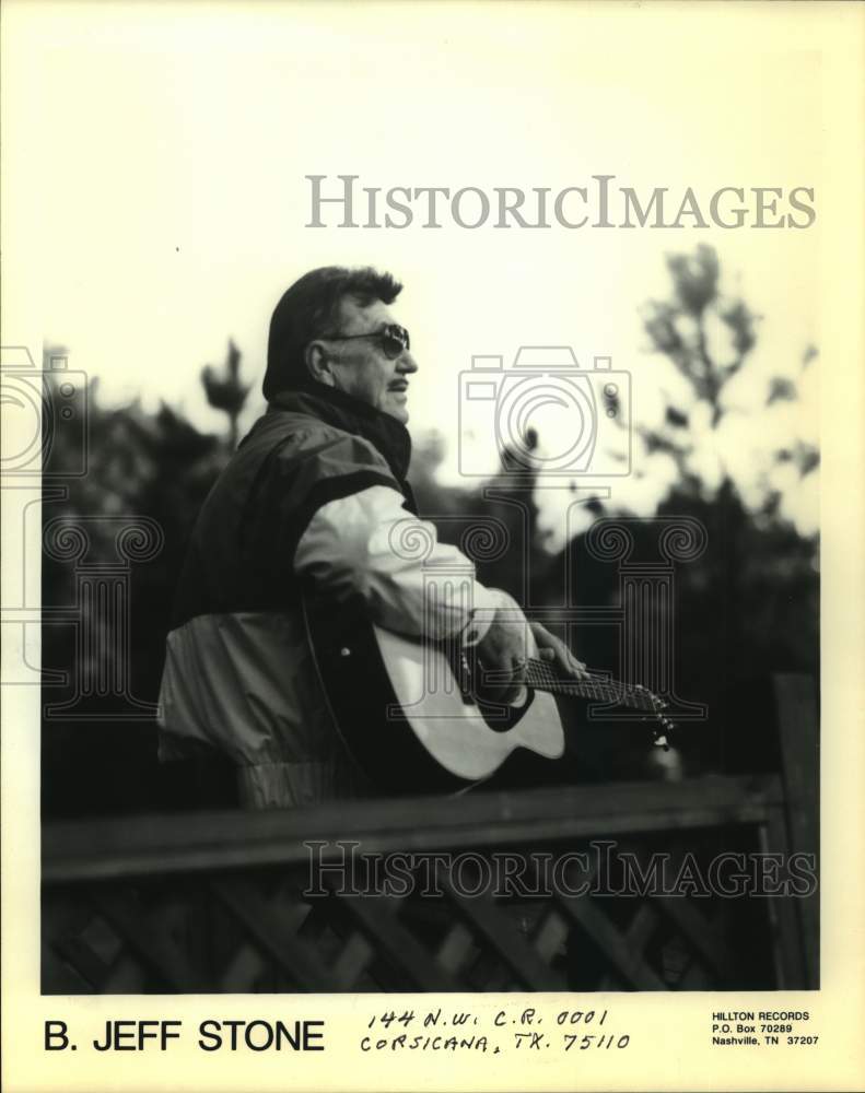 Press Photo Musician B. Jeff Stone Plays Guitar on Patio Deck - Historic Images