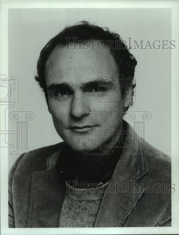 Press Photo Portrait of Man in Sweater & Sports Jacket - Historic Images