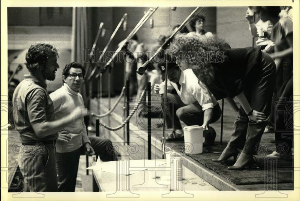 Press Photo People preparing for a singing or entertaining competition. - Historic Images