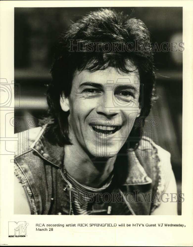Press Photo Rick Sprinfield guest VJ's on MTV: Music Television. - Historic Images