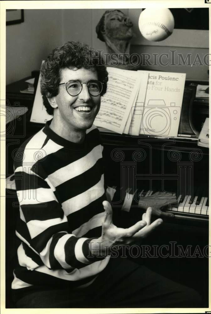 1993 Press Photo Musician Samuel Sanders Tosses Baseball at Piano in New York - Historic Images