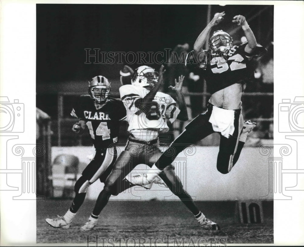 1988 Justin Still of Clark breaks up a pass intended for James Lott-Historic Images