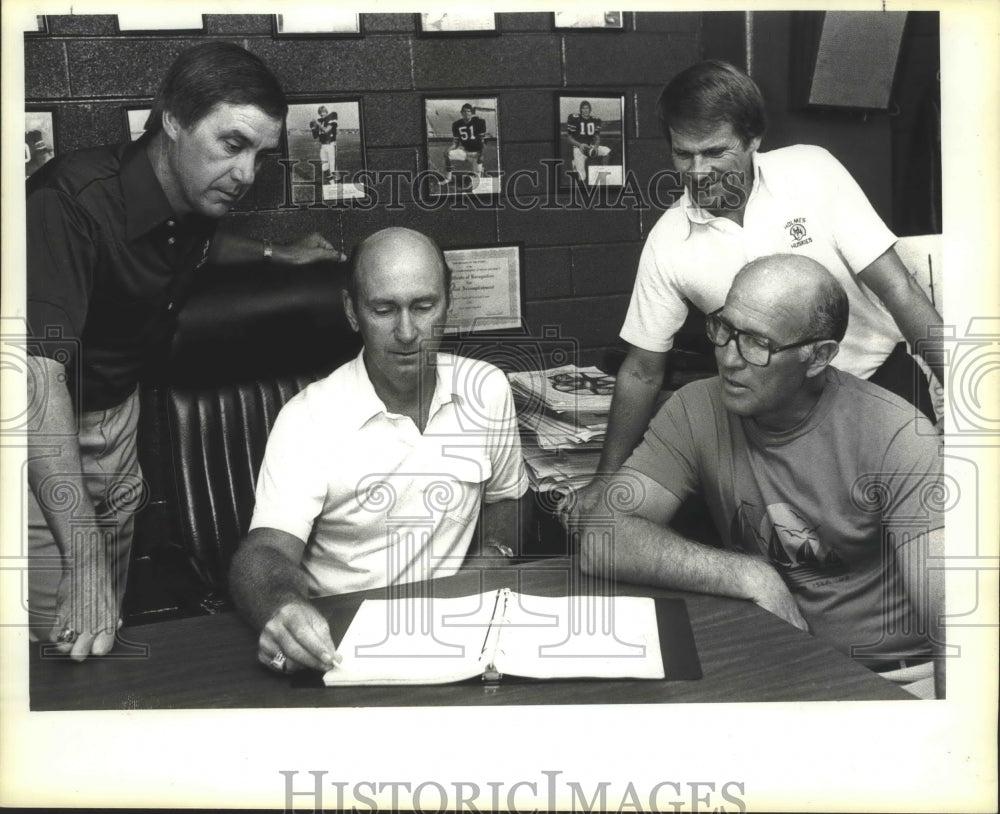 1984 Press Photo Football coaches gather at Churchill High School - sas00210- Historic Images