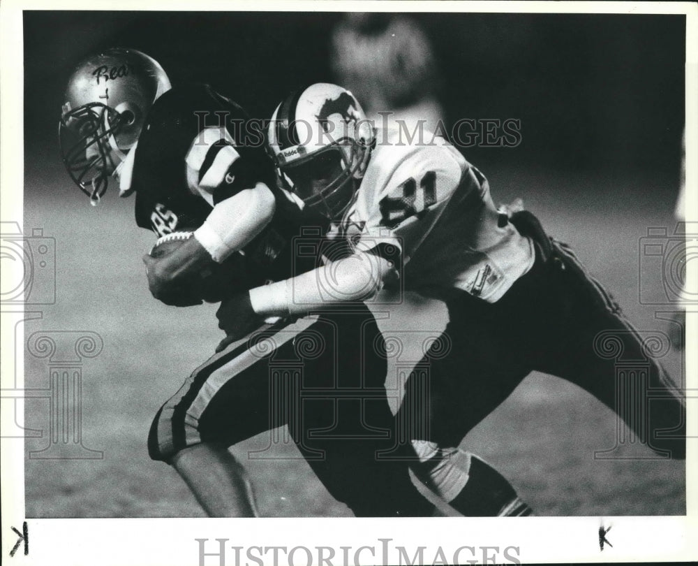 1988 Press Photo Edison and Jefferson play a high school football game - Historic Images