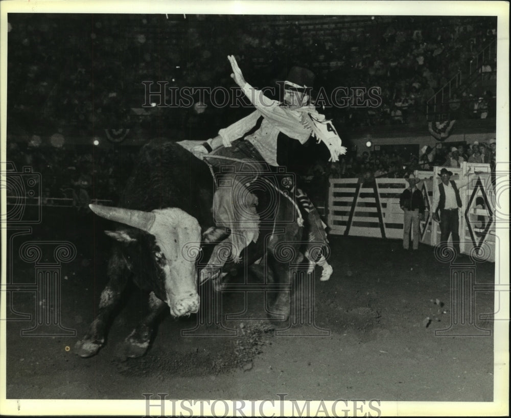 1986 Bull Rider Rides a Bull at Rodeo - sas06681 - Historic Images