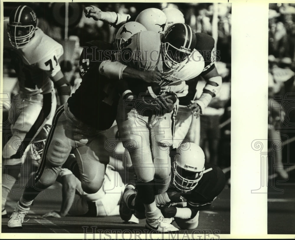 1986 Press Photo University of Texas and Houston College Football Players - Historic Images