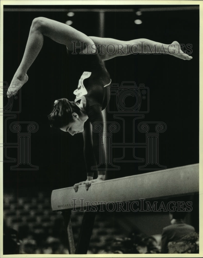 1988 Press Photo Monica Covacci, Gymnast at Alamo Arena Classic on Balance Beam- Historic Images