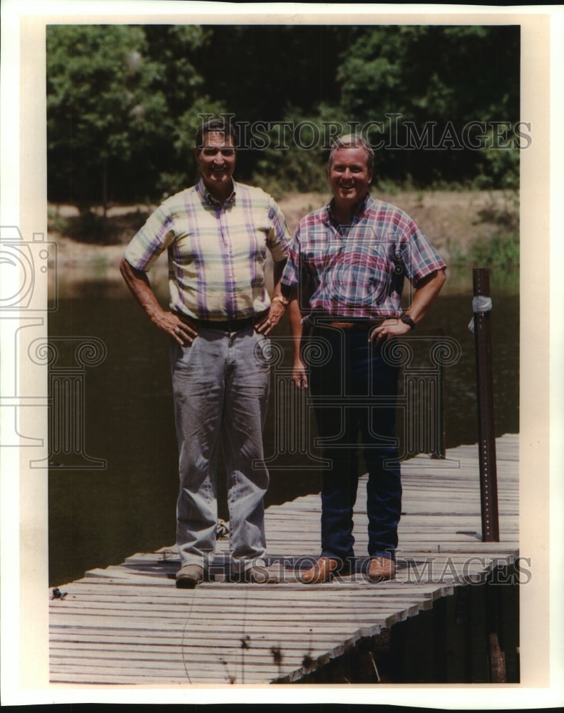 Press Photo Jim Dent and Gene Stallings at Paris, Texas Ranch Dock - sas07358- Historic Images