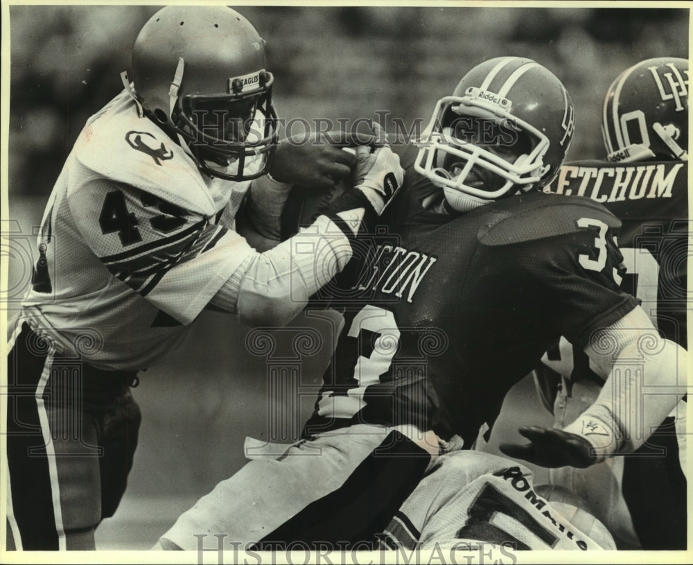 1984 Press Photo College Football Players Neil Iton and Raymond Tate at Game- Historic Images