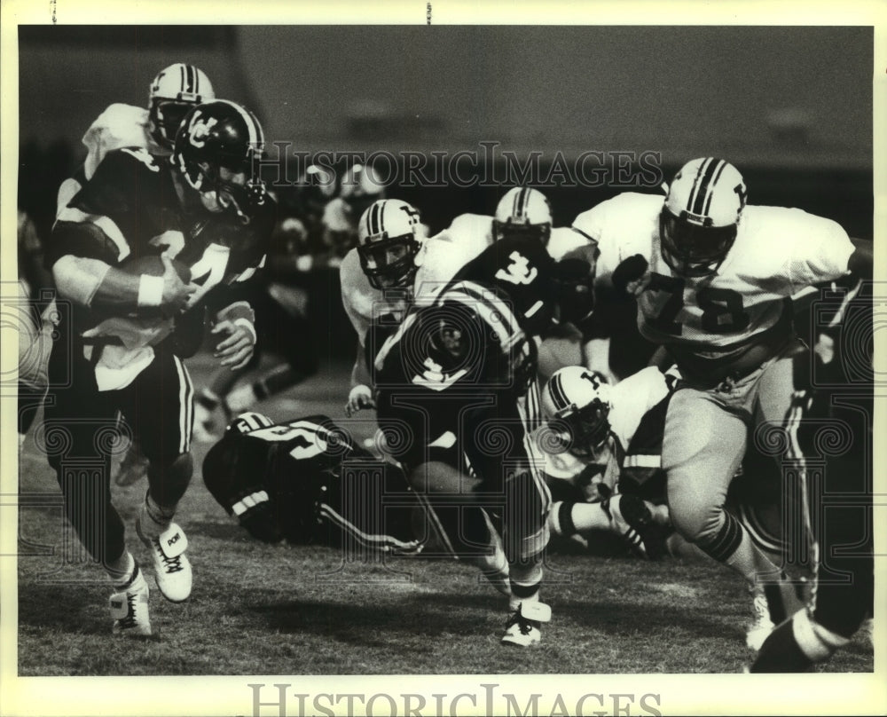 1984 Press Photo Churchill and Harlandale High School Football Players at Game- Historic Images