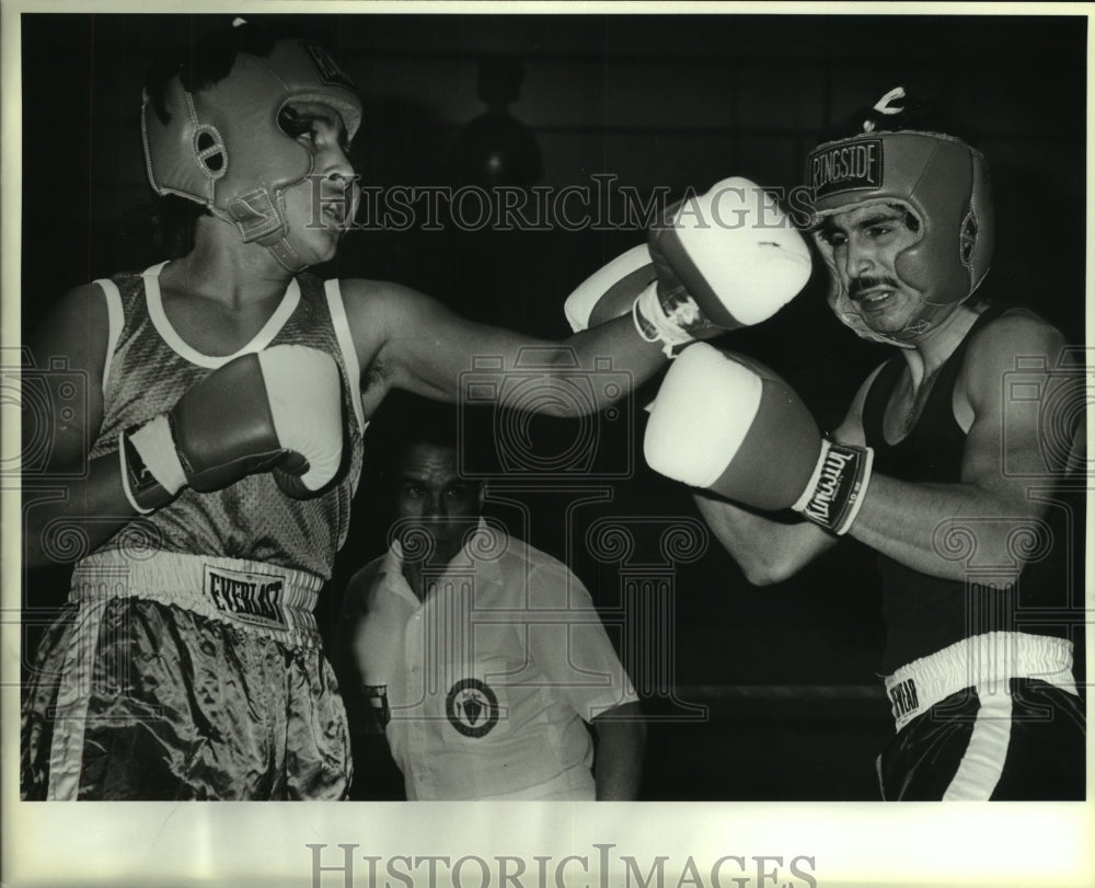 1987 Press Photo Boxers Ramiro Ramirez and Jeffrey Vasquez at Golden Gloves Bout-Historic Images