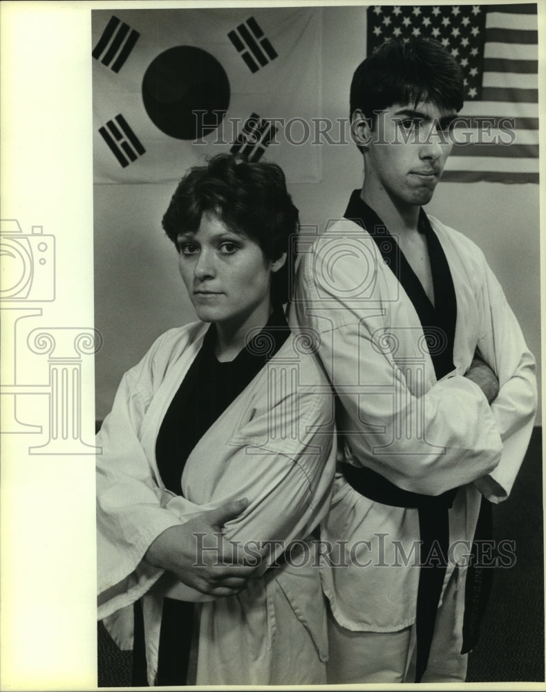 1986 Press Photo Martial artists Rhonda Juarez and John Slaughter - sas13055 - Historic Images