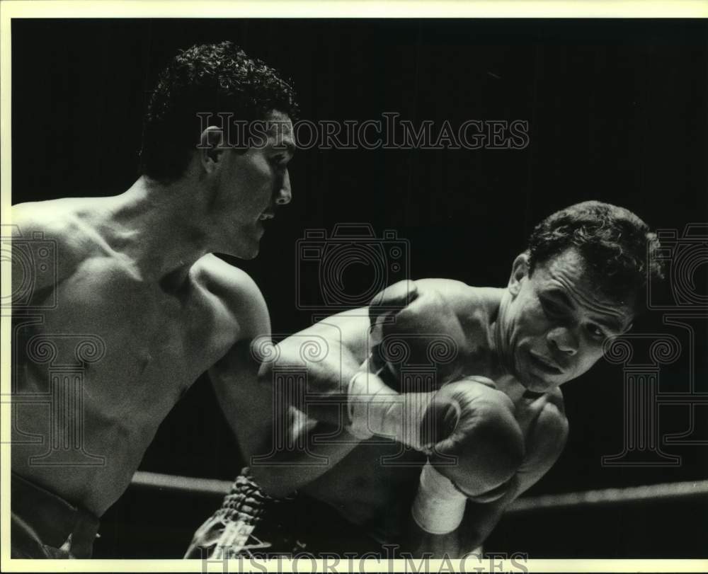 Press Photo Boxer Aaron Lopez in action - sas13946-Historic Images