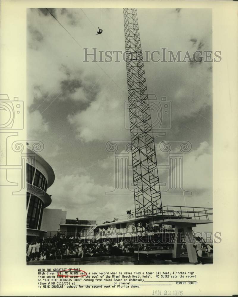 1975 Press Photo High diver Bill McGuire dives into the Miami Beach Hyatt pool - Historic Images