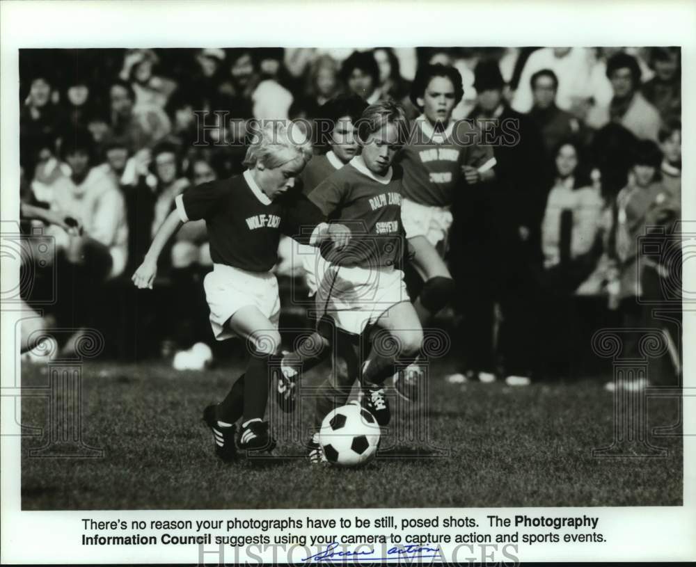 Press Photo Youth soccer players in action - sas15555- Historic Images