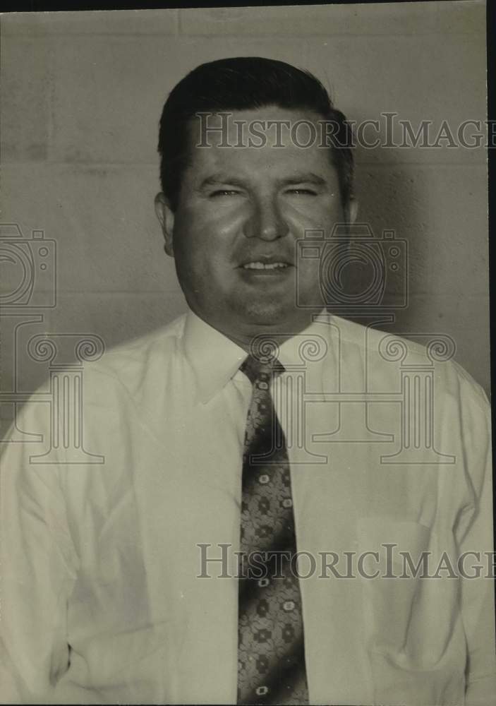 Press Photo A man in a shirt and tie poses for a photo - sas16914 - Historic Images