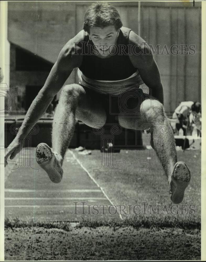 1986 Press Photo Long jumper Mike Marsh in action - sas17591 - Historic Images
