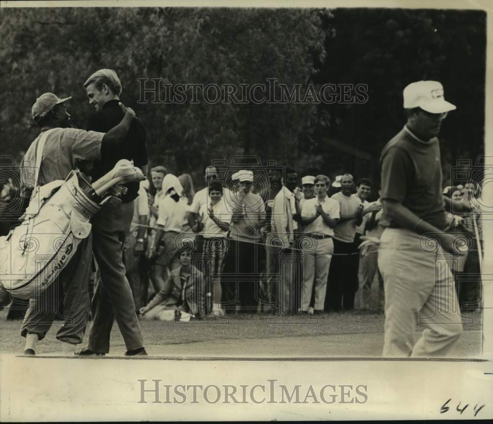1969 Pro golfer Larry Hinson and his caddie - Historic Images