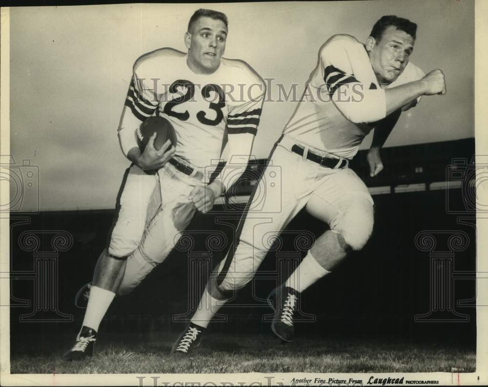 1957 Press Photo University of Mississippi Football Players Running on Field - Historic Images