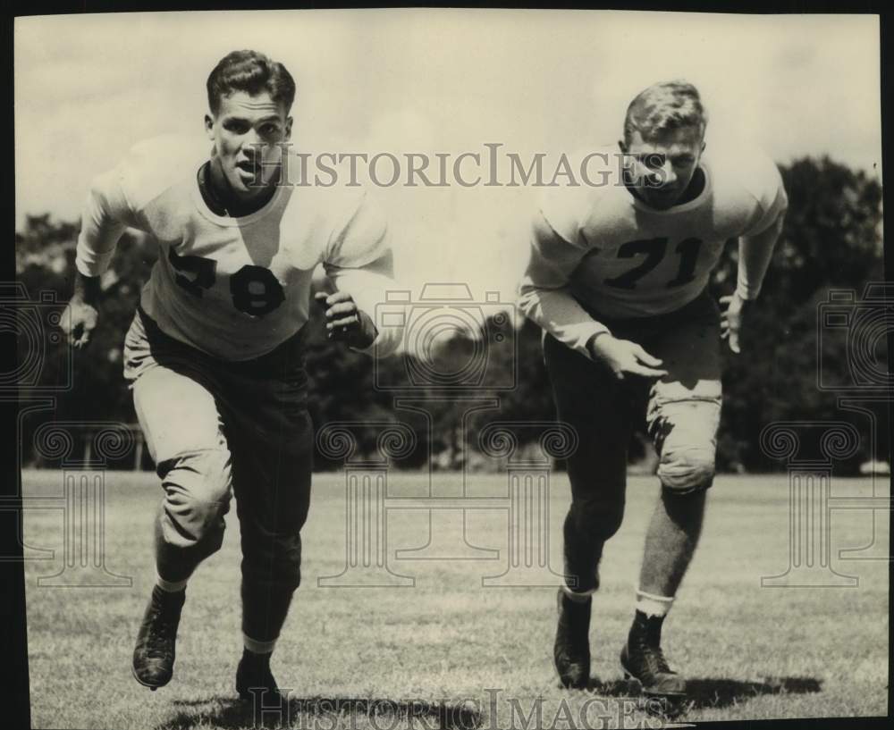 Press Photo Football Players John Bob Watts &amp; Errol Fry Run on Field - sas22082 - Historic Images
